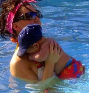 Mommy teaching swimming lessons